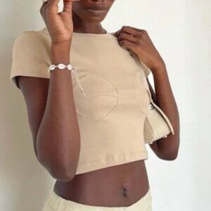 Orseund Iris Circle Bust Knit Tee in Sand color way